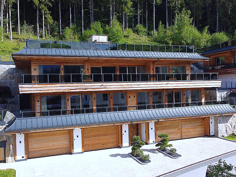 Luxuriöse Wohnungen im Dreifamilienhaus mit Pool in den Kitzbüheler Alpen
